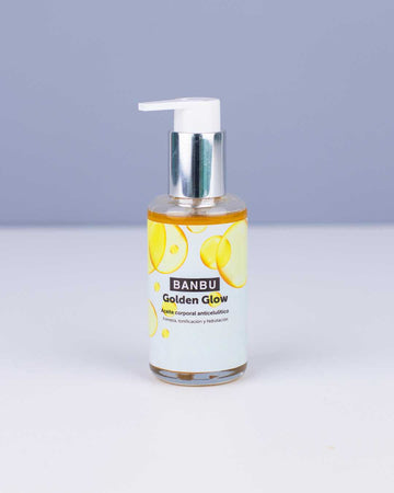 Aceite anticelulítico Golden Glow en envase de cristal, un aceite corporal natural con efecto reafirmante y antiestrías.